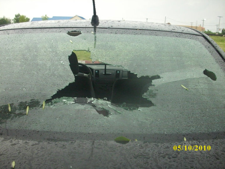 car window smashed by hail